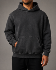 TELLS Afterglow Poster Hoodie in Black, plain front studio model view