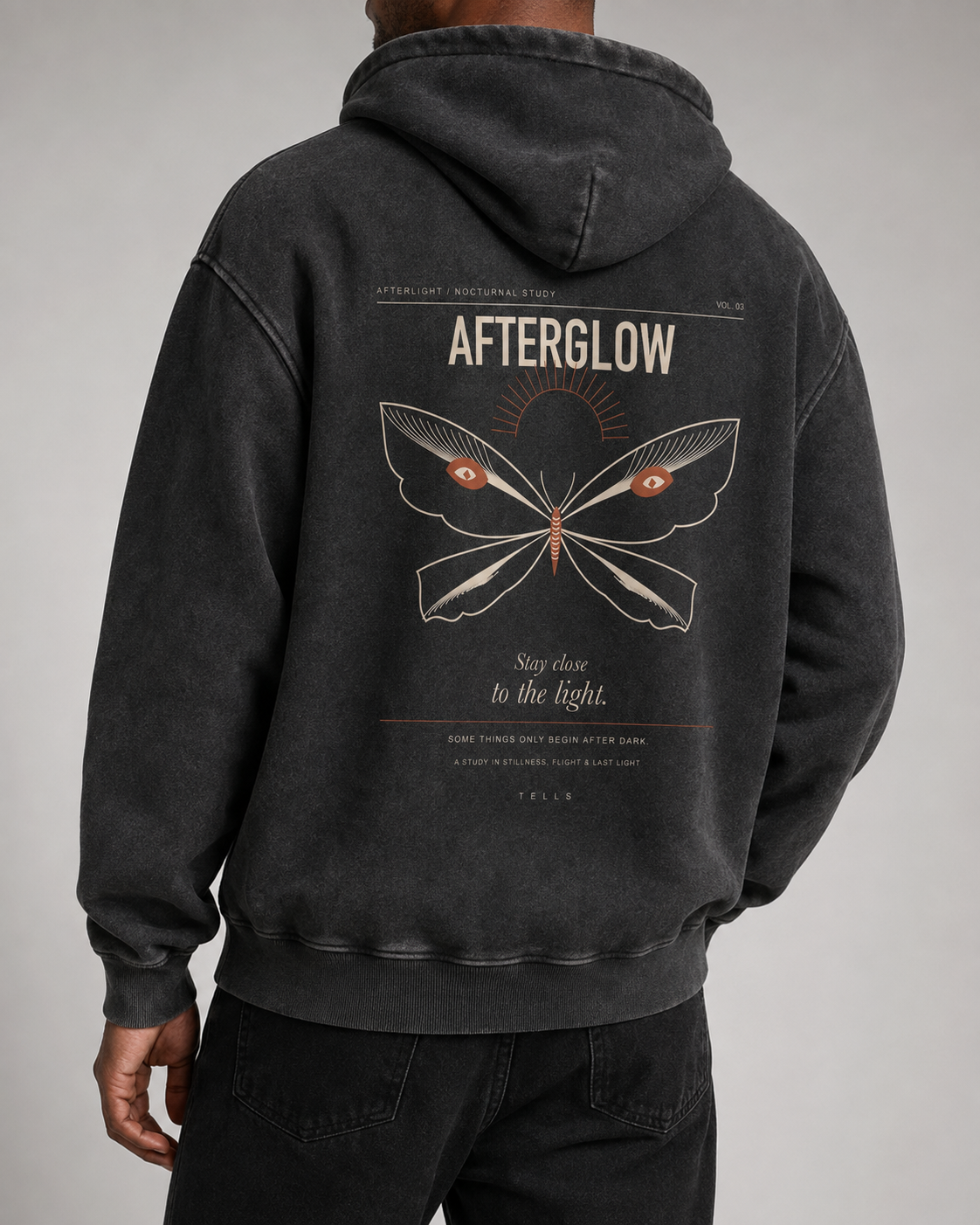 TELLS Afterglow Poster Hoodie in Black, three-quarter back studio view