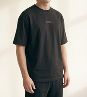 TELLS Embroidered Oversized Black T-Shirt — cropped below face