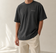 TELLS Faded Oversized Black T-Shirt — cropped below face