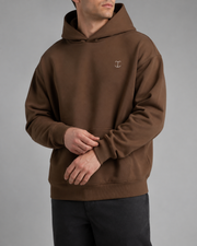 TELLS Signature Coffee Hoodie, three-quarter front studio view