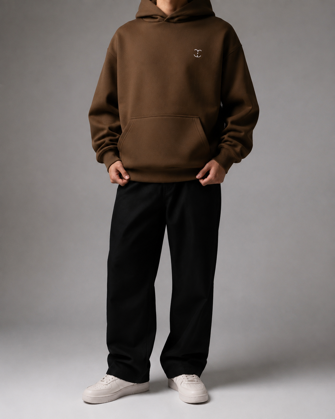 TELLS Signature Coffee Hoodie, full length front studio view