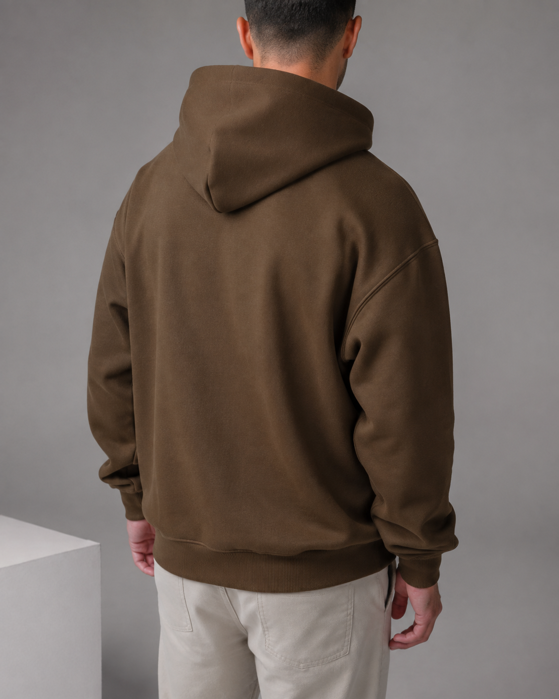 TELLS Signature Coffee Hoodie, plain back studio view