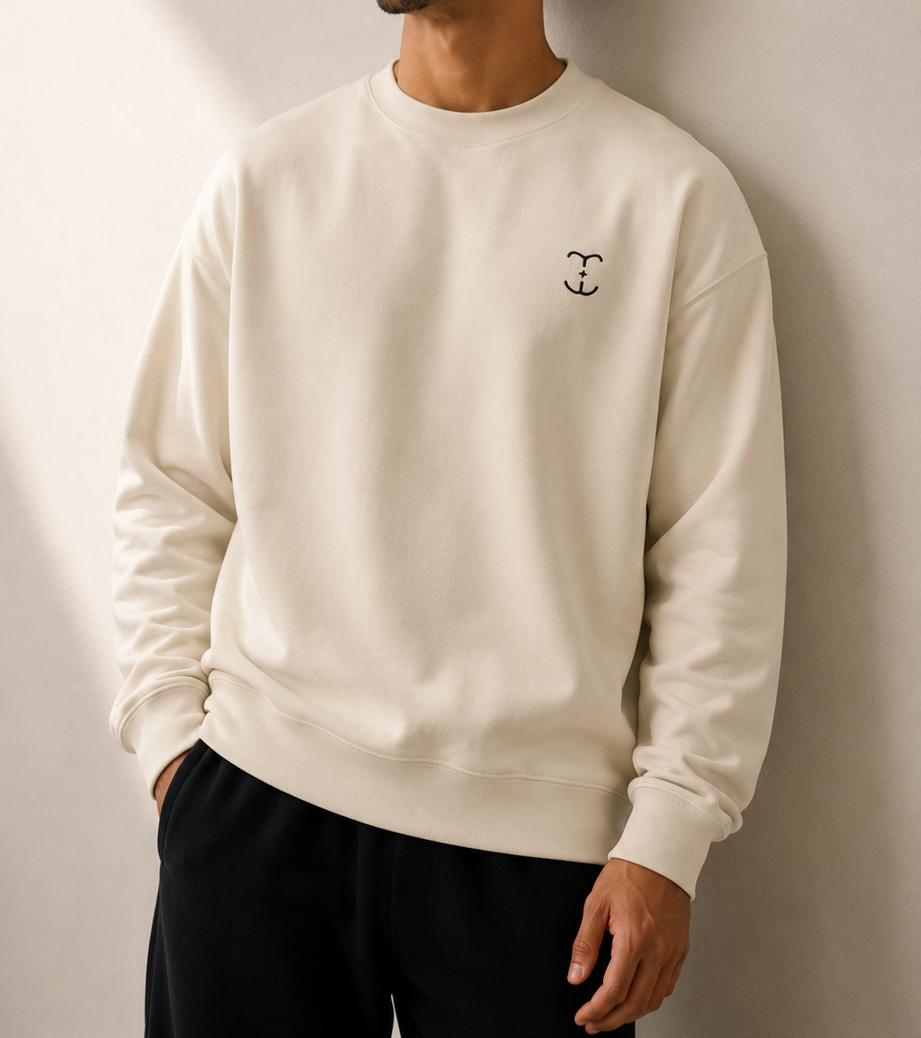 TELLS Signature Mark Beige Sweatshirt — cropped below face