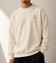 TELLS Signature Mark Beige Sweatshirt — cropped below face