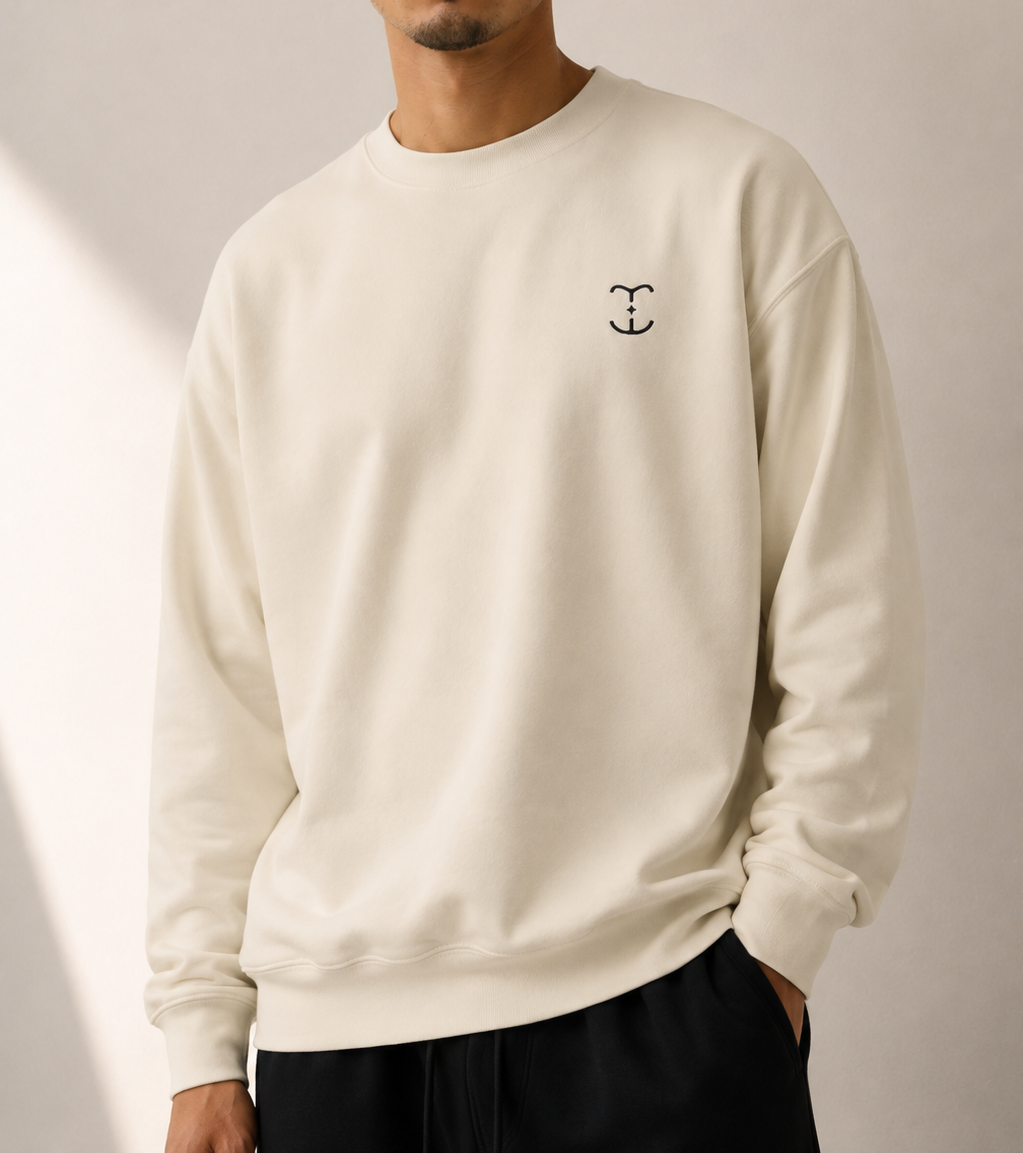 TELLS Signature Mark Beige Sweatshirt — cropped below face