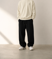 TELLS Signature Mark Beige Sweatshirt — cropped below face