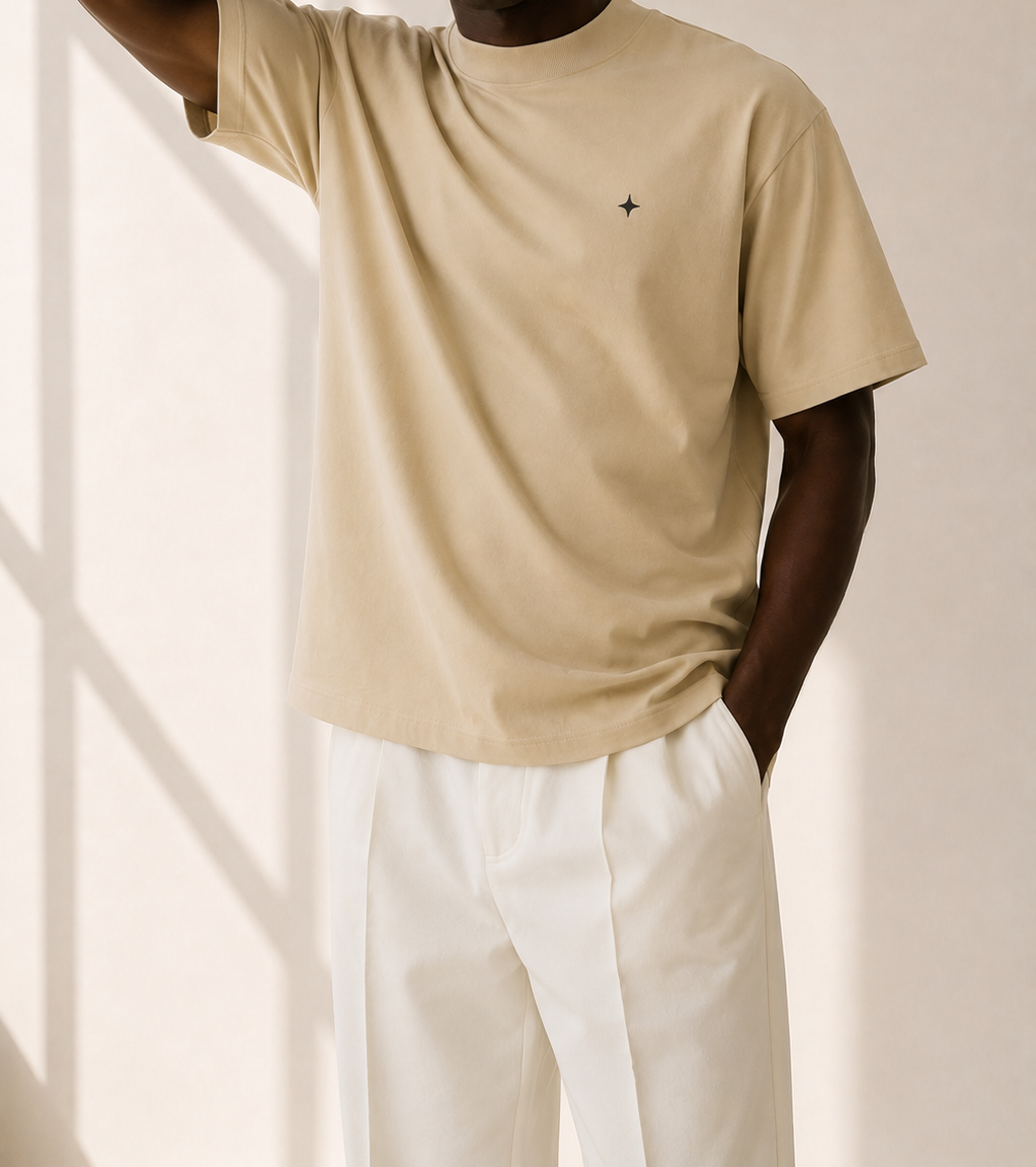 TELLS Signature Oversized Beige T-Shirt — cropped below face