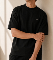 TELLS Signature Oversized Black T-Shirt — cropped below face
