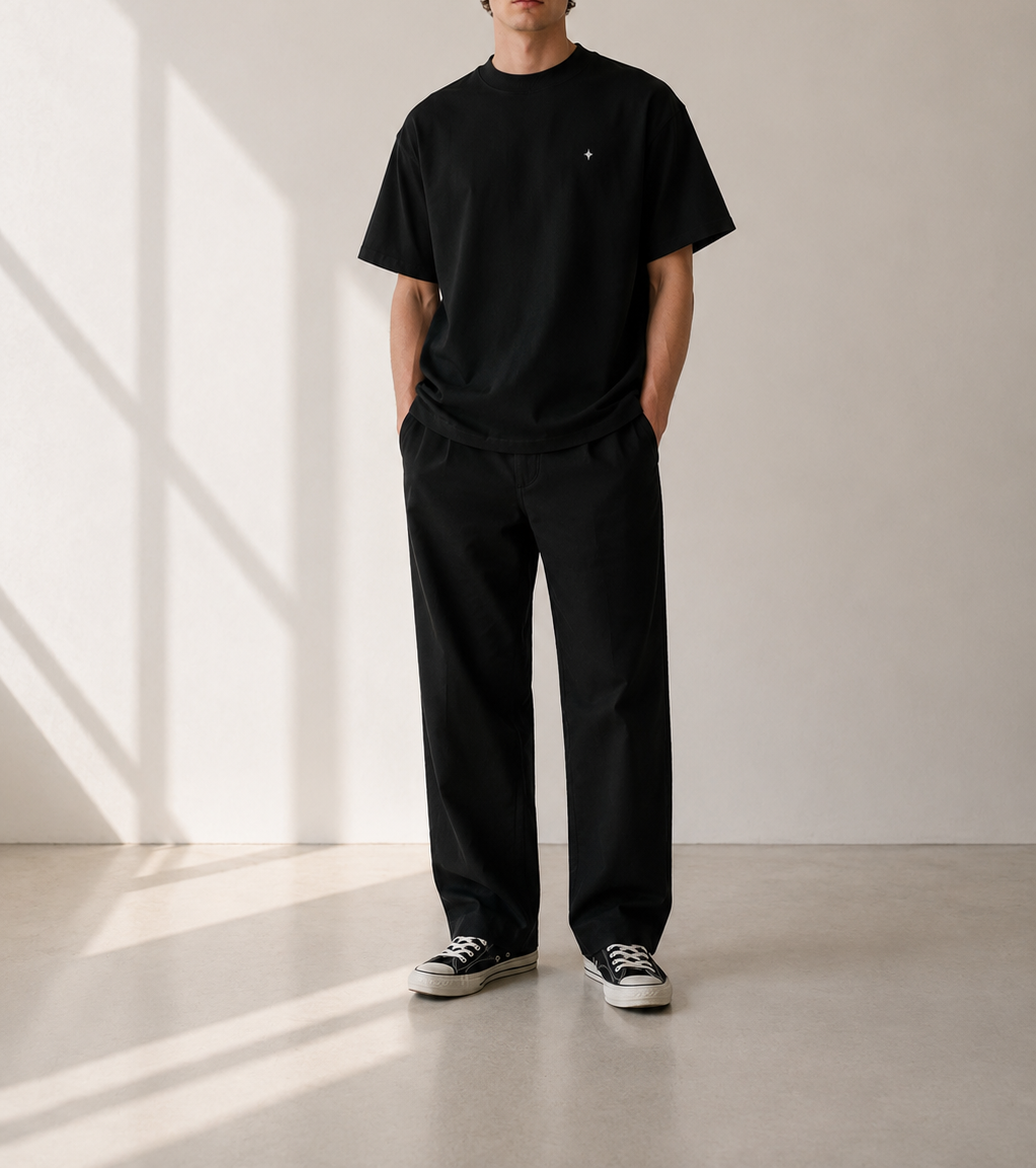 TELLS Signature Oversized Black T-Shirt — cropped below face