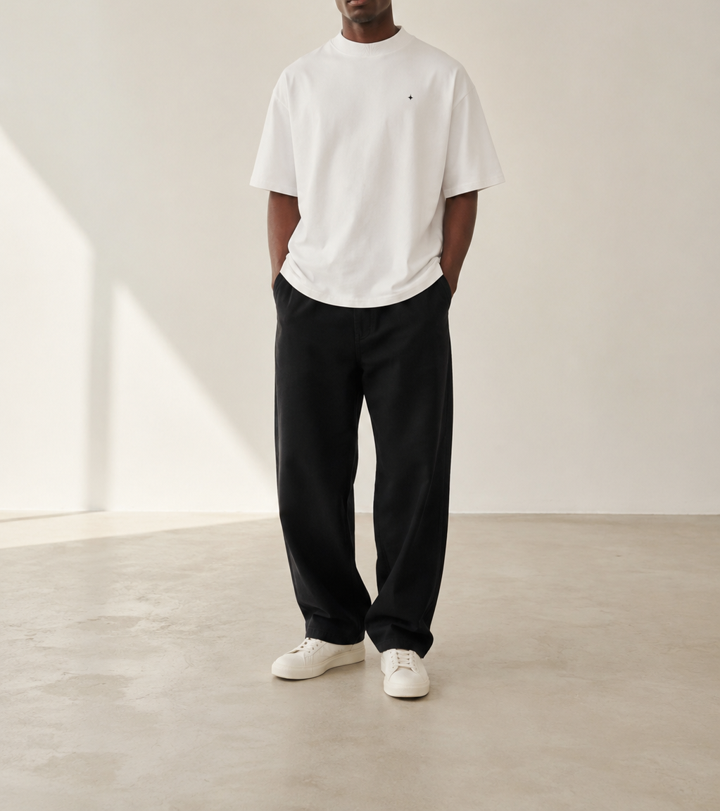 TELLS Signature Oversized White T-Shirt — cropped below face