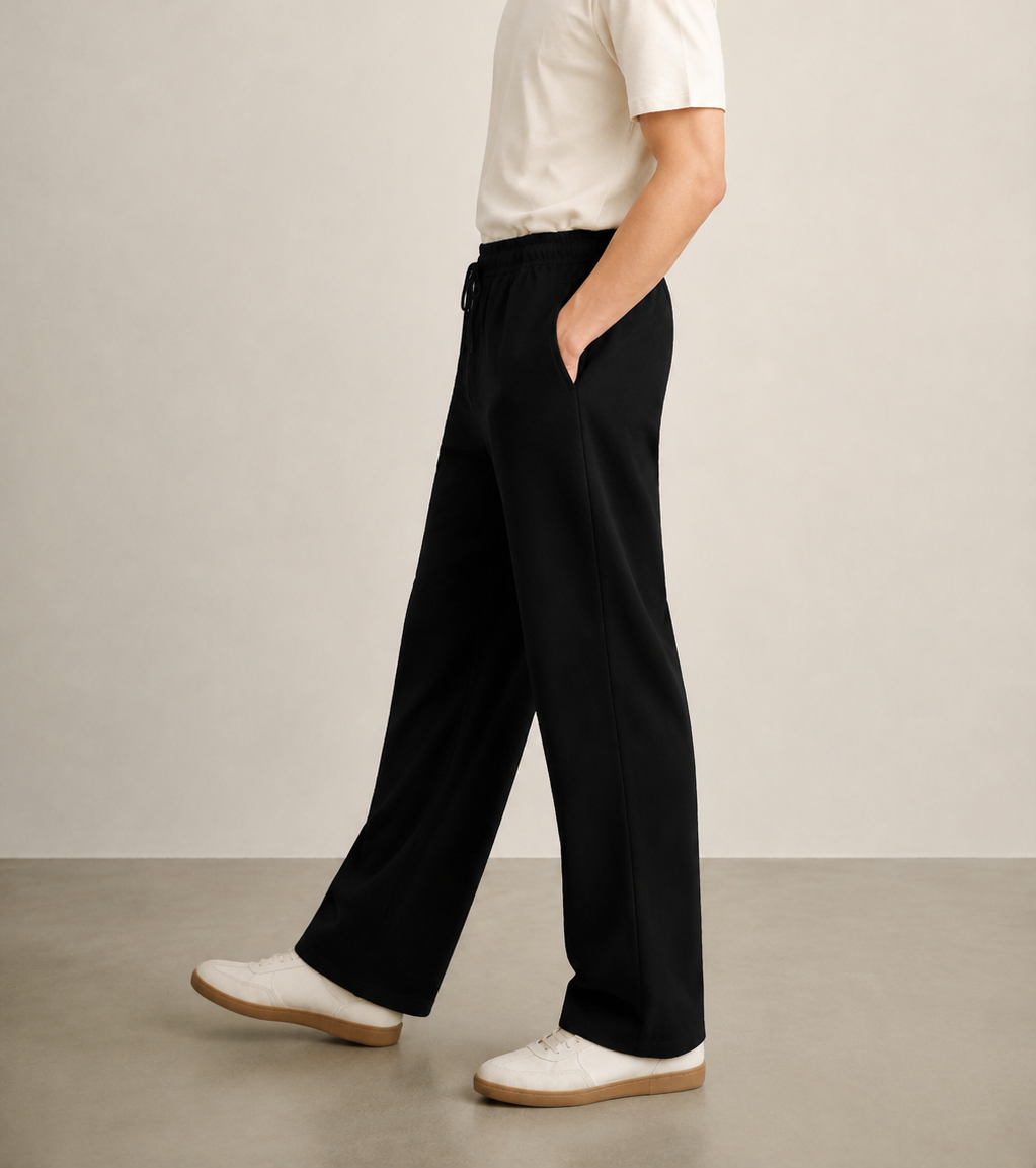 TELLS Straight-Leg Black Sweatpants — cropped below face