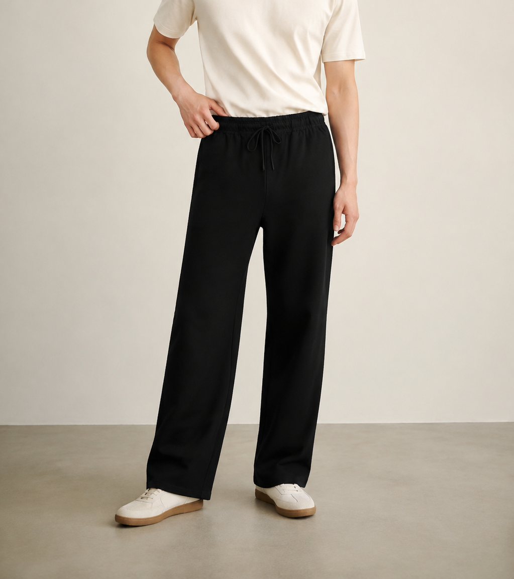 TELLS Straight-Leg Black Sweatpants — cropped below face