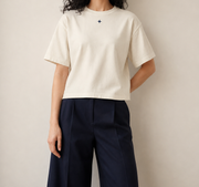Women’s Signature Star Beige Boxy Tee — cropped below face
