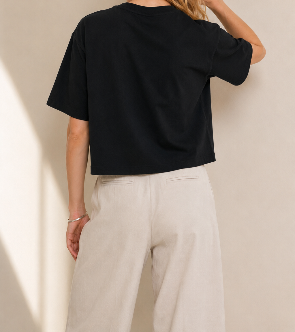 Women’s Signature Star Black Boxy Tee — cropped below face