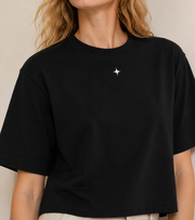 Women’s Signature Star Black Boxy Tee — cropped below face