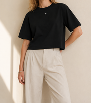 Women’s Signature Star Black Boxy Tee — cropped below face