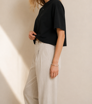 Women’s Signature Star Black Boxy Tee — cropped below face