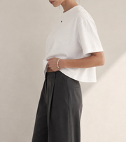 Women’s Signature Star White Boxy Tee — cropped below face