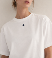 Women’s Signature Star White Boxy Tee — cropped below face
