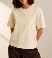 Women’s TELLS Classic Apricot Boxy Tee — cropped below face