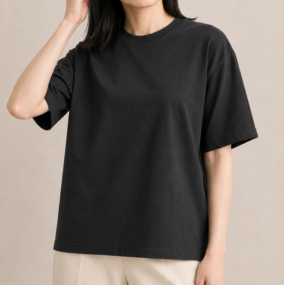 Women’s TELLS Classic Black Boxy Tee — cropped below face