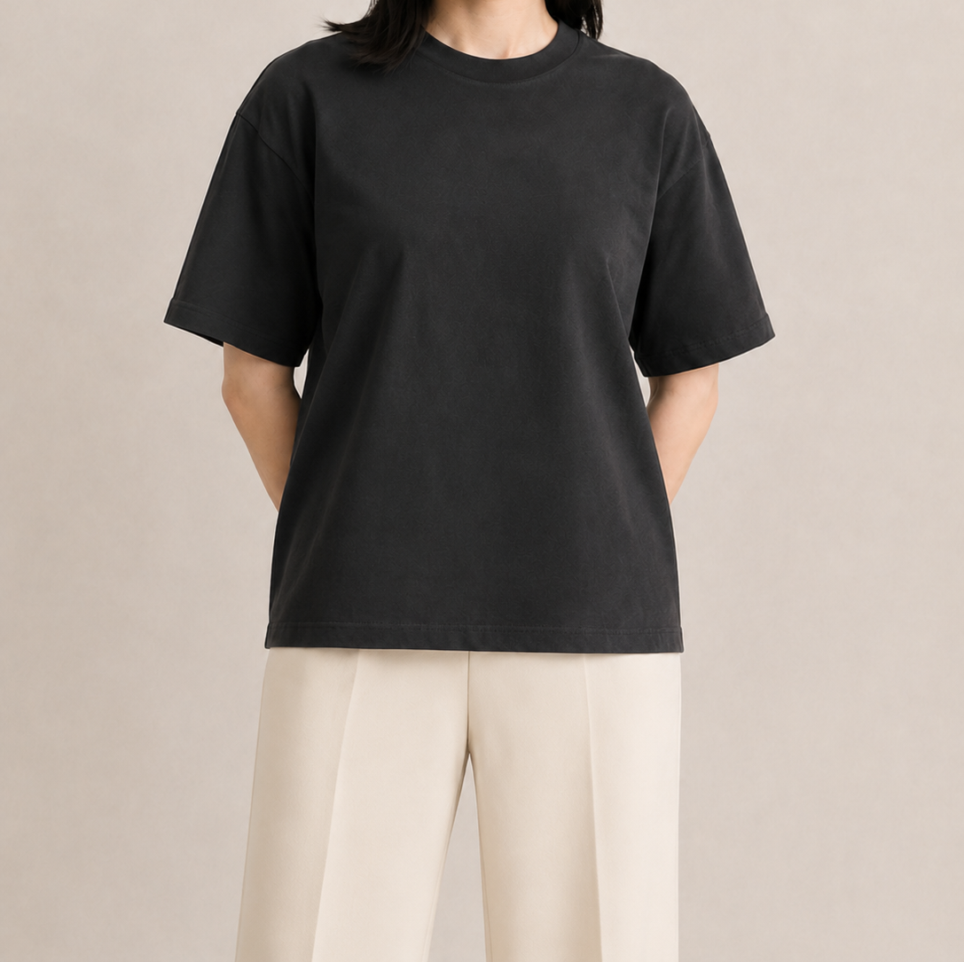 Women’s TELLS Classic Black Boxy Tee — cropped below face