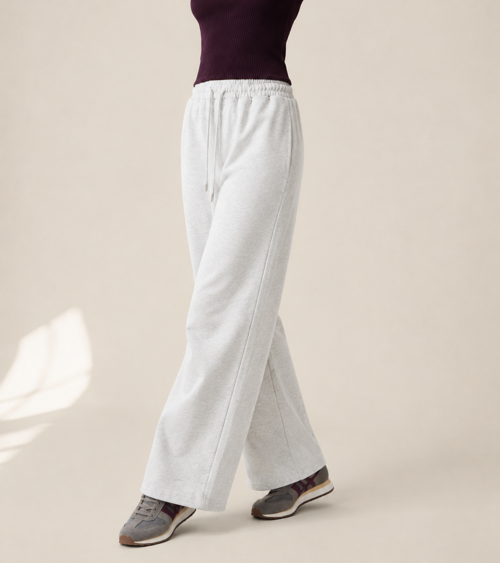 Women’s TELLS Essential Wide-Leg Light Gray Sweatpants — cropped below face
