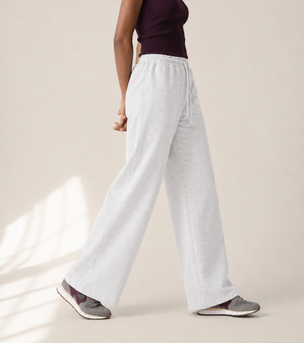 Women’s TELLS Essential Wide-Leg Light Gray Sweatpants — cropped below face