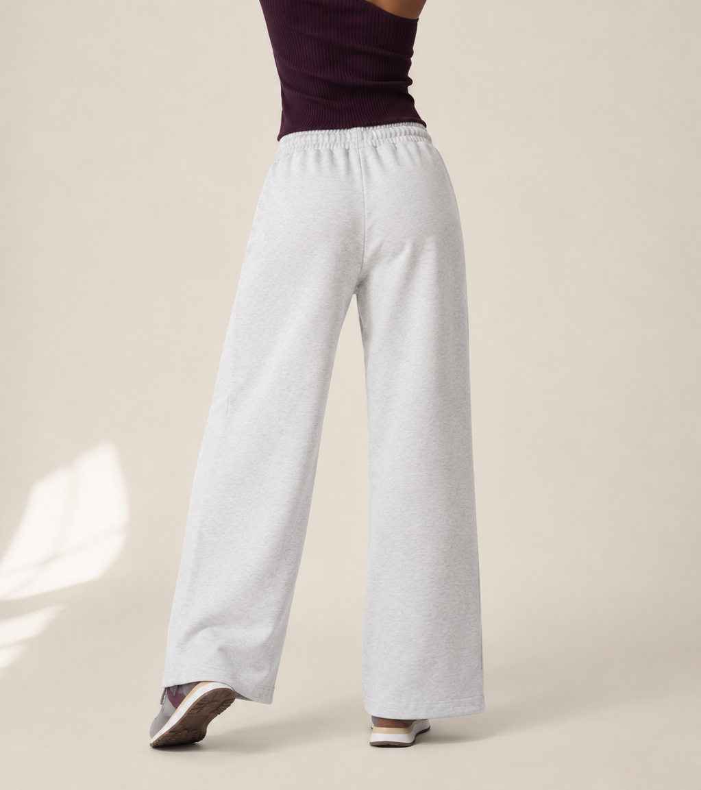 Women’s TELLS Essential Wide-Leg Light Gray Sweatpants — cropped below face