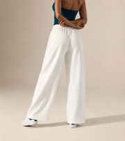 Women’s TELLS Essential Wide-Leg White Sweatpants — cropped below face