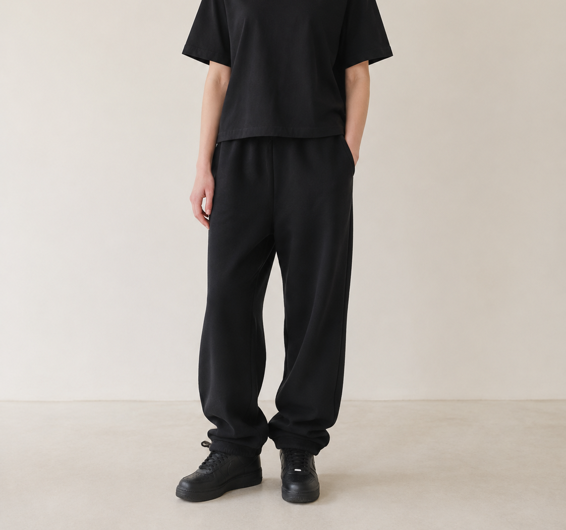 Women’s TELLS Real Flex Black Boxy Tee — cropped below face