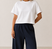 Women’s TELLS Real Flex White Boxy Tee — cropped below face
