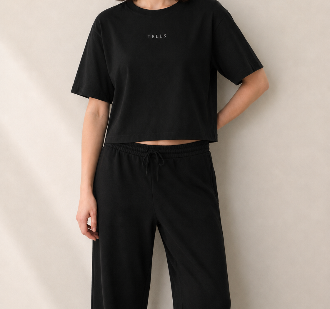 Women’s TELLS Signature Black Boxy Tee — cropped below face