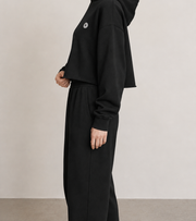 Women’s TELLS Signature Cropped Black Hoodie — cropped below face