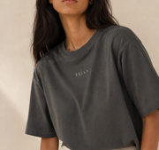 Women’s TELLS Signature Dark Gray Boxy Tee — cropped below face