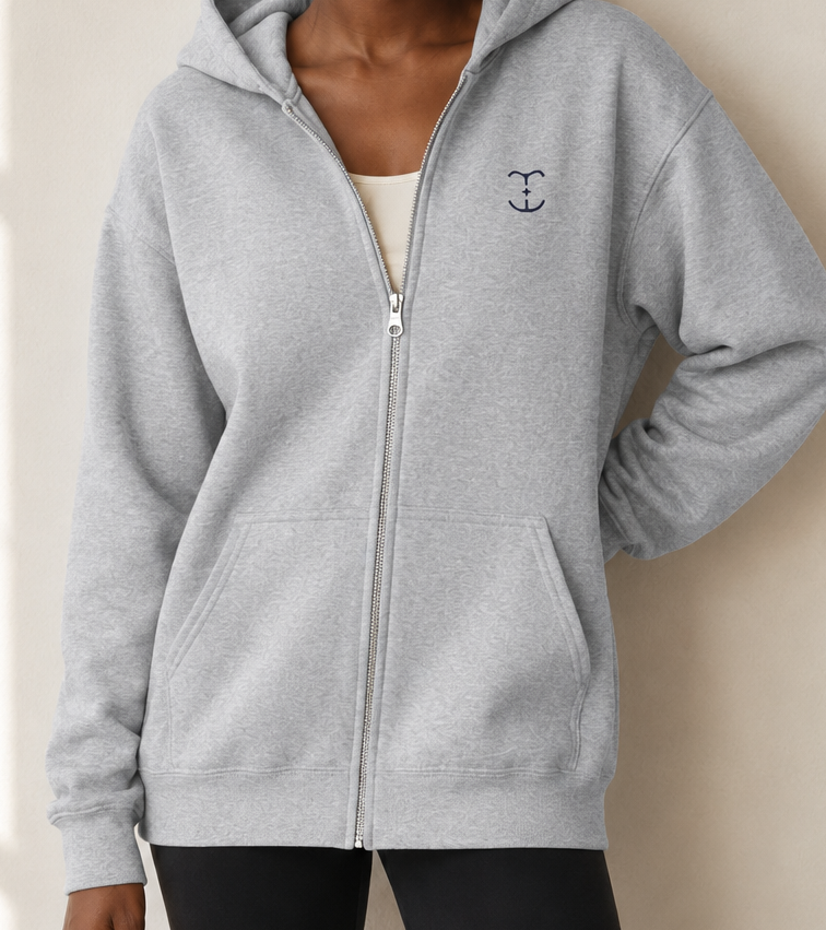 Women’s TELLS Signature Gray Zip Hoodie — cropped below face