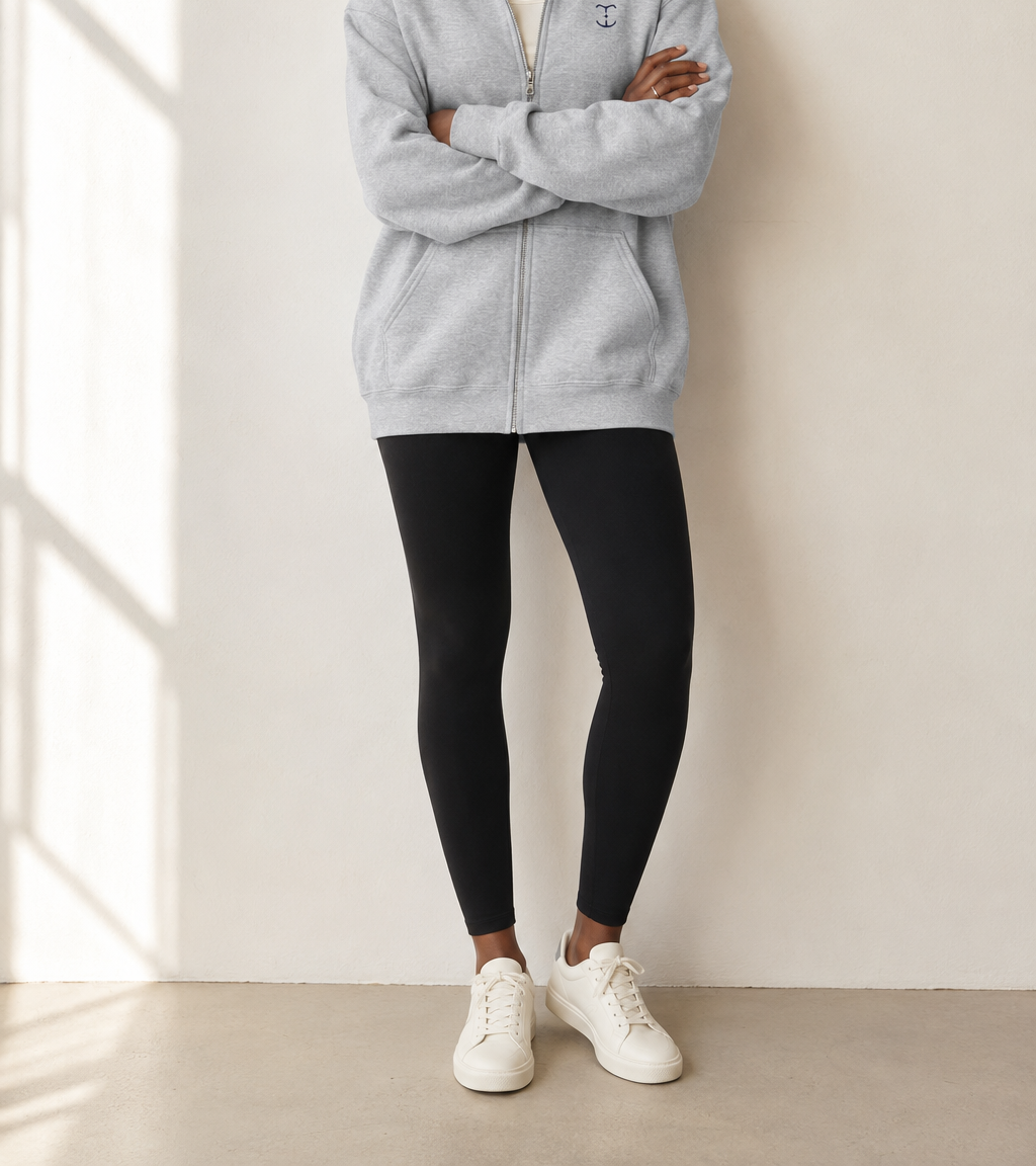 Women’s TELLS Signature Gray Zip Hoodie — cropped below face