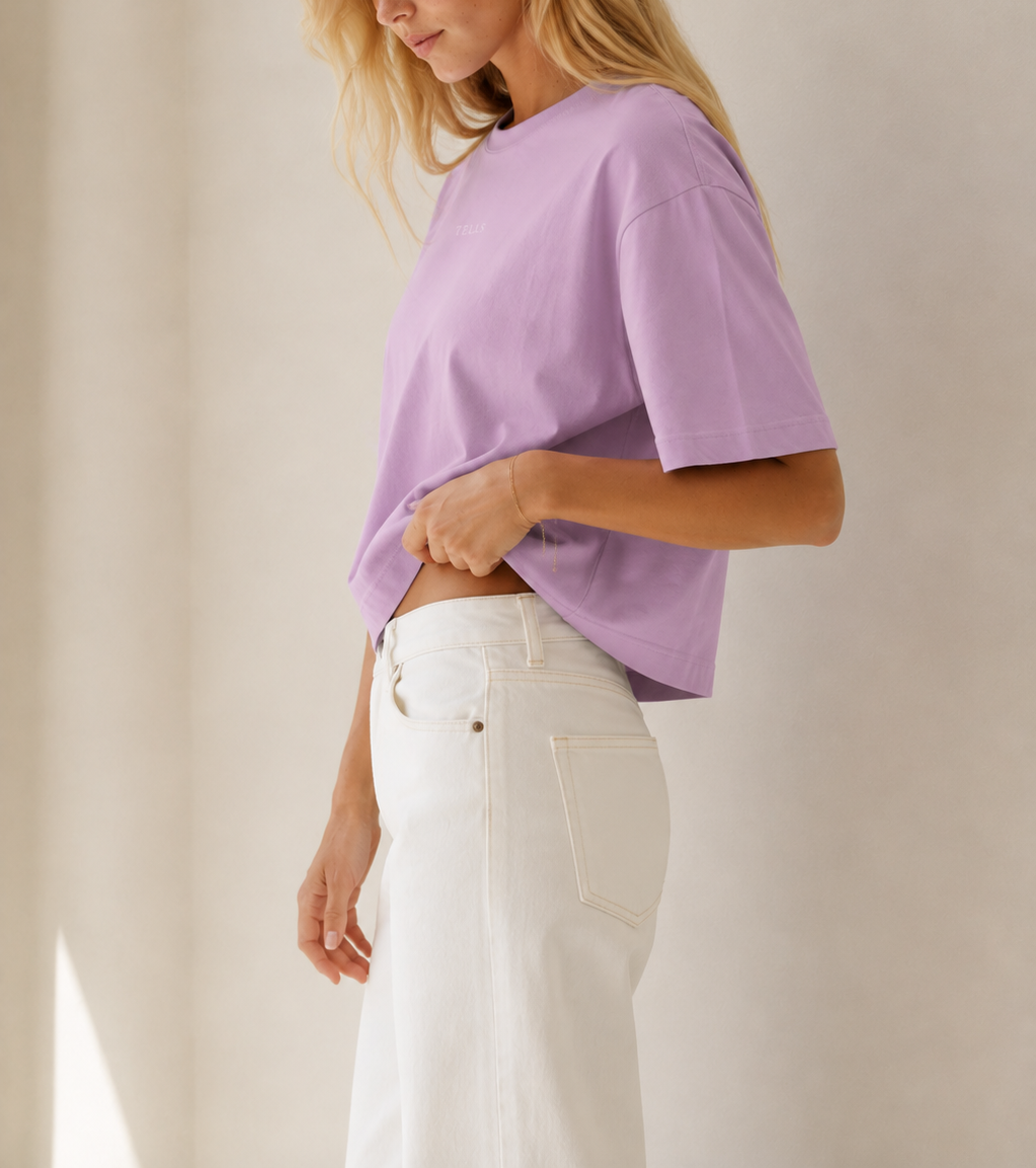 Women’s TELLS Signature Pink Boxy Tee — cropped below face