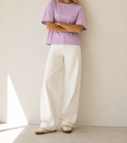 Women’s TELLS Signature Pink Boxy Tee — cropped below face